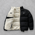 Doudoune double face sur fond gris